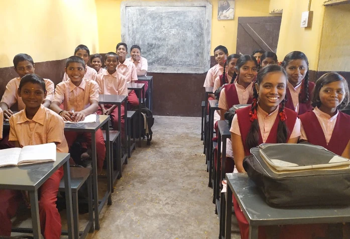 furniture for rural schools in India, smiling children